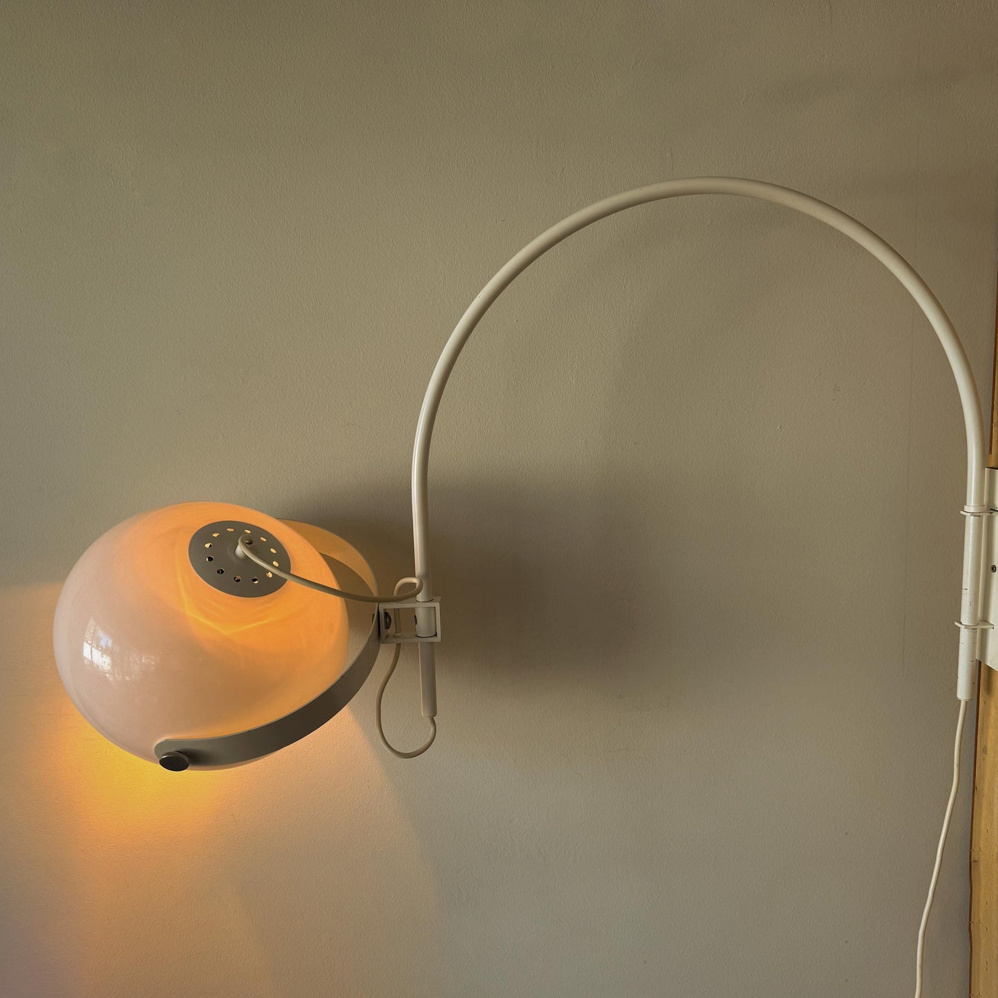 Mid-Century Space Age mushroom wall lamp by Dijkstra with white rounded shade and curved arm.