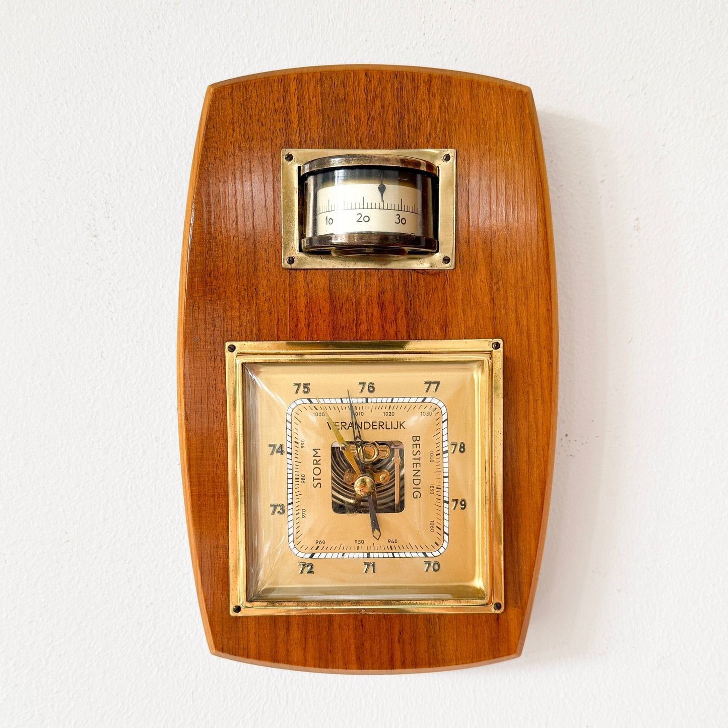 Mid-century modern wall barometer with thermometer, wood and brass, mid-20th century. &nbsp;By vintagefindsbyrenata