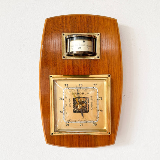 Mid-century modern wall barometer with thermometer, wood and brass, mid-20th century. &nbsp;By vintagefindsbyrenata