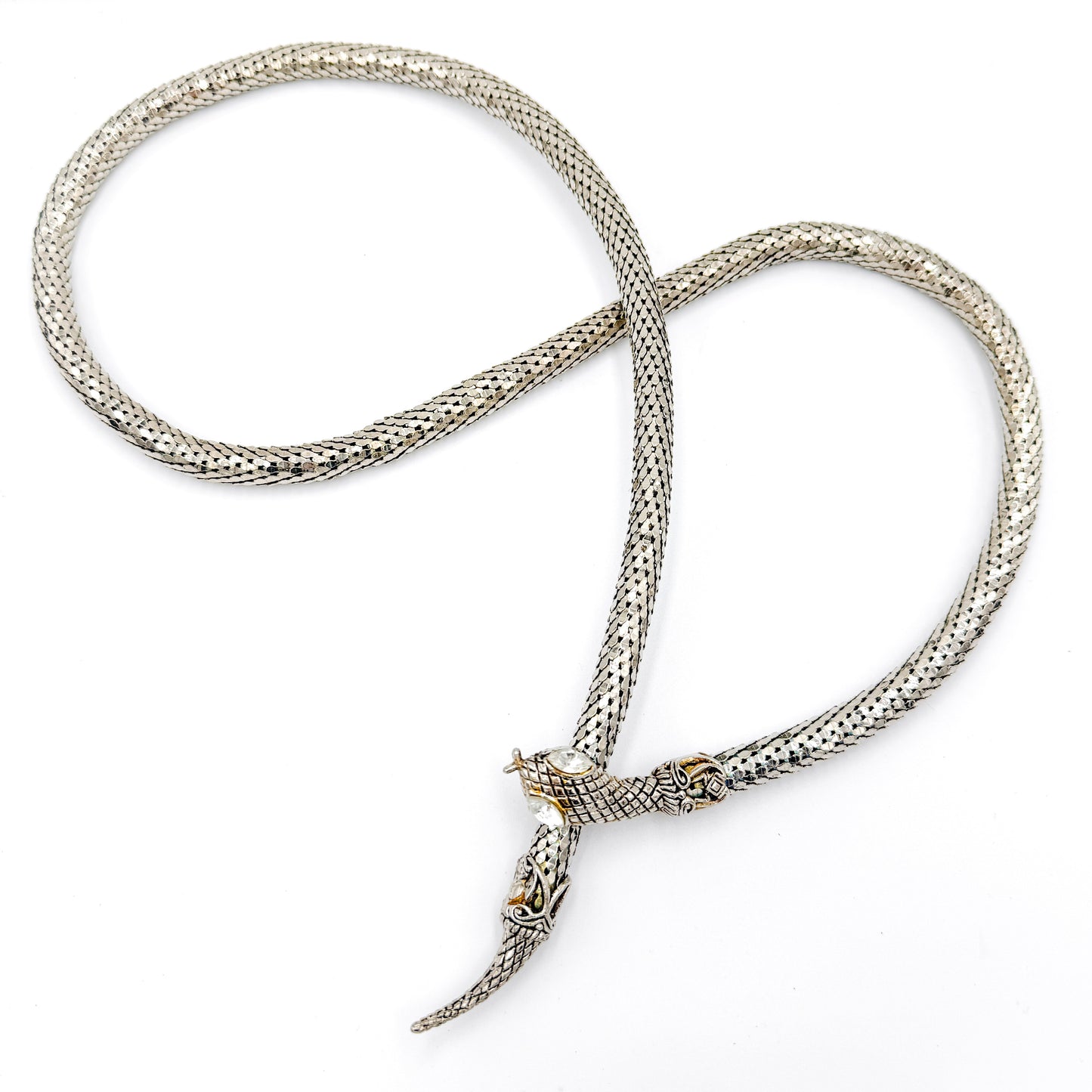 Vintage snake mesh necklace, silver-tone metal, sculptural serpent form with rhinestone eyes.