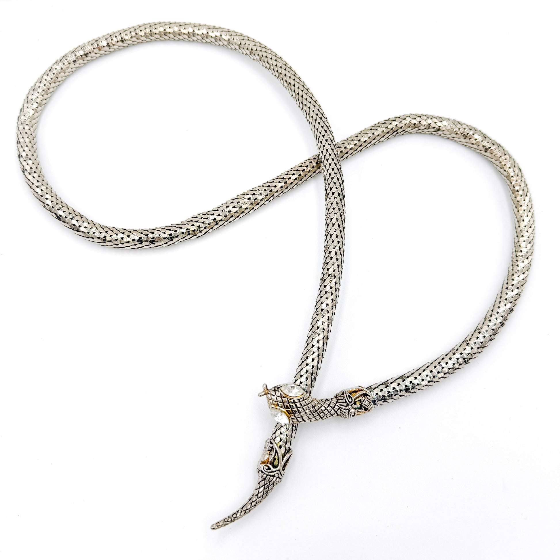 Vintage snake mesh necklace, silver-tone metal, sculptural serpent form with rhinestone eyes.