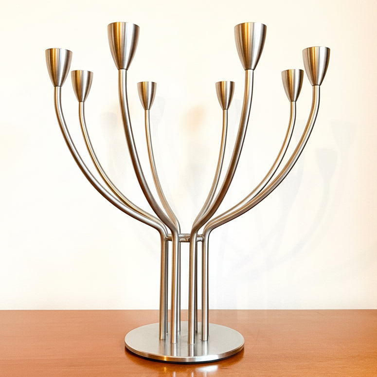 Vintage IKEA Stockholm stainless steel candelabra by Knut and Marianne Hagberg, Scandinavian Modern design with curved arms and silver finish.