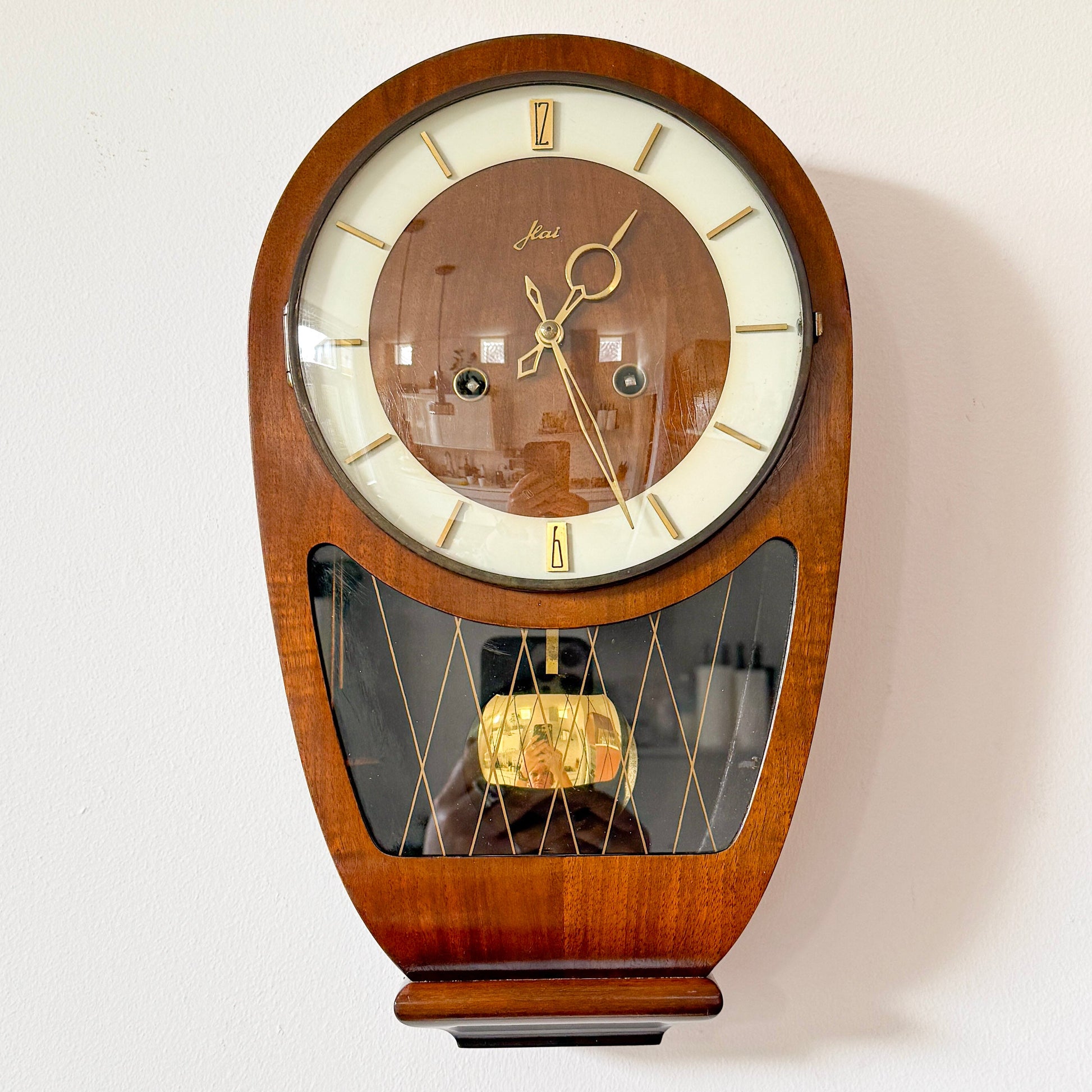 Mid-Century Modern Haid wall clock with Hermle movement, wood, brass and glass. By vintagefindsbyrenata