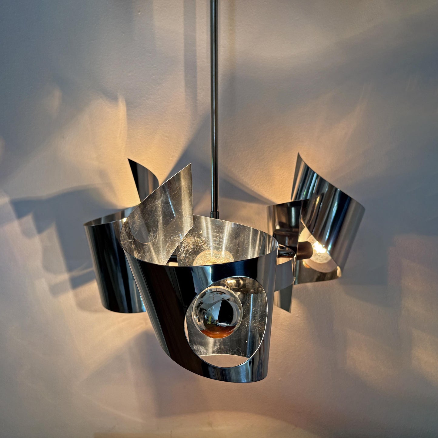 Mid-Century Modern Space Age chrome pendant lamp with three tubular elements, European vintage design.