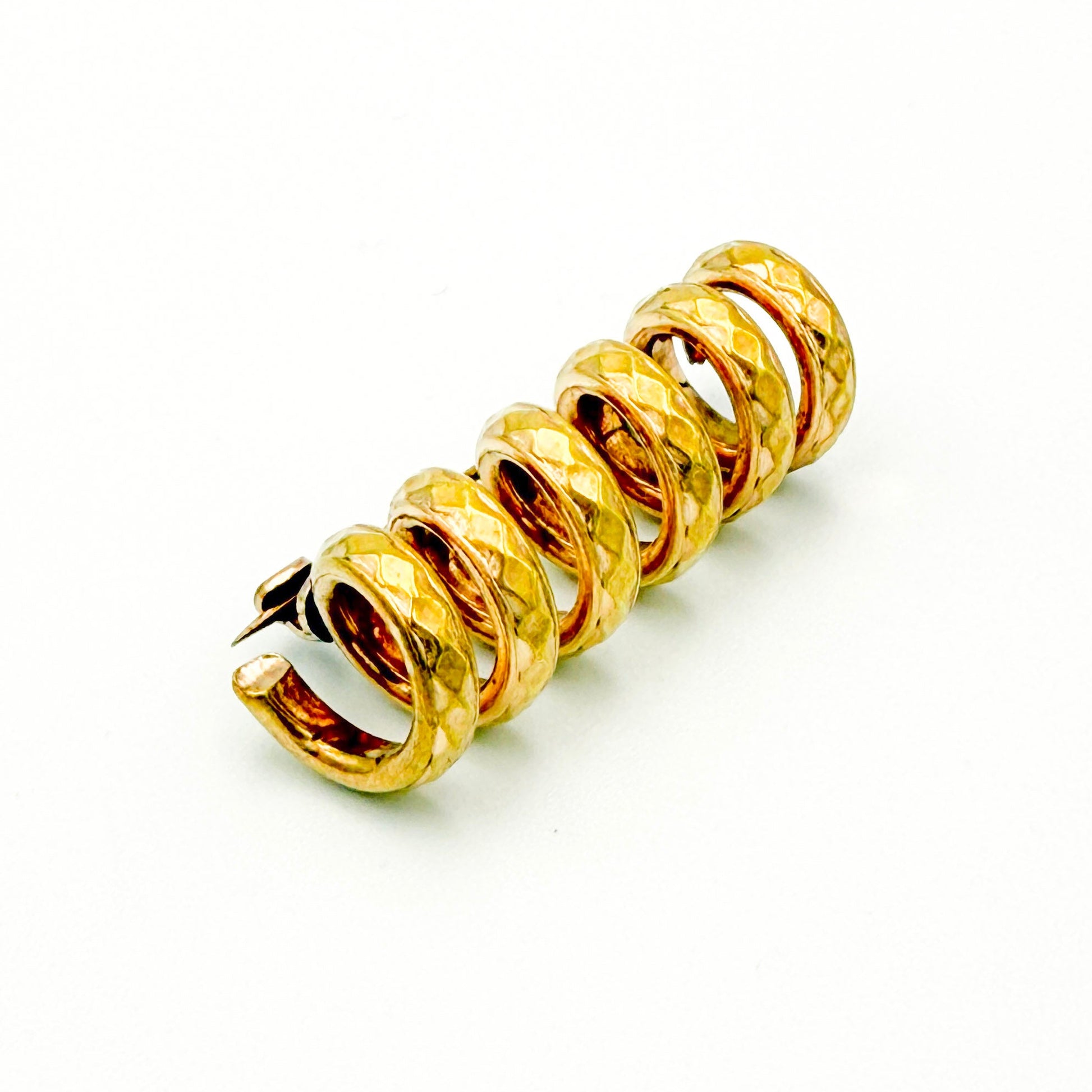 Mid-century modern spiral brooch, hammered gold-tone metal, vintage.