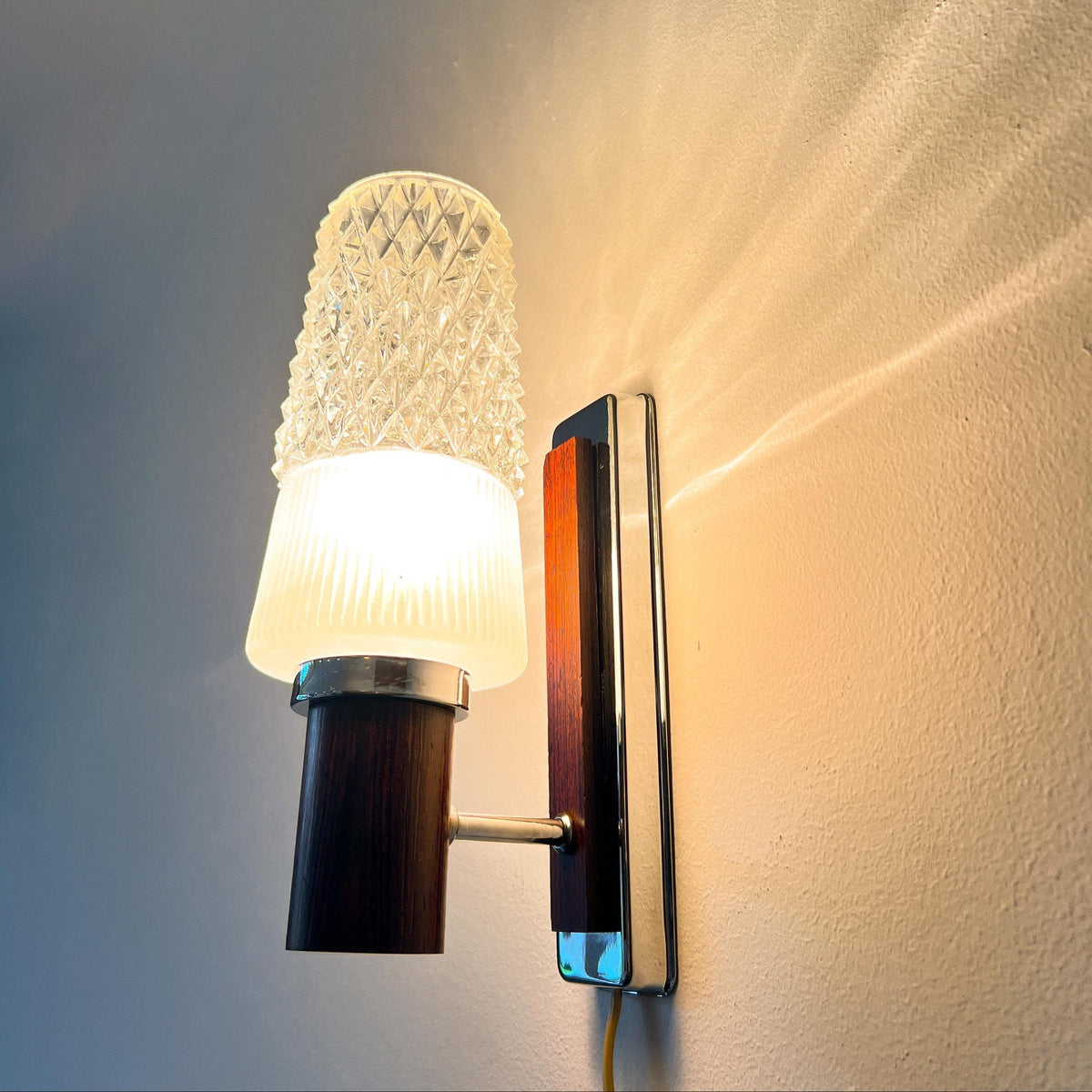 Mid-Century teak, metal and glass wall lamp with frosted and cut glass shade, 1960s.