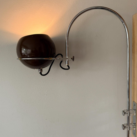 Space Age mushroom arc wall lamp with brown spherical shade and chrome arched arm attributed to Gepo.