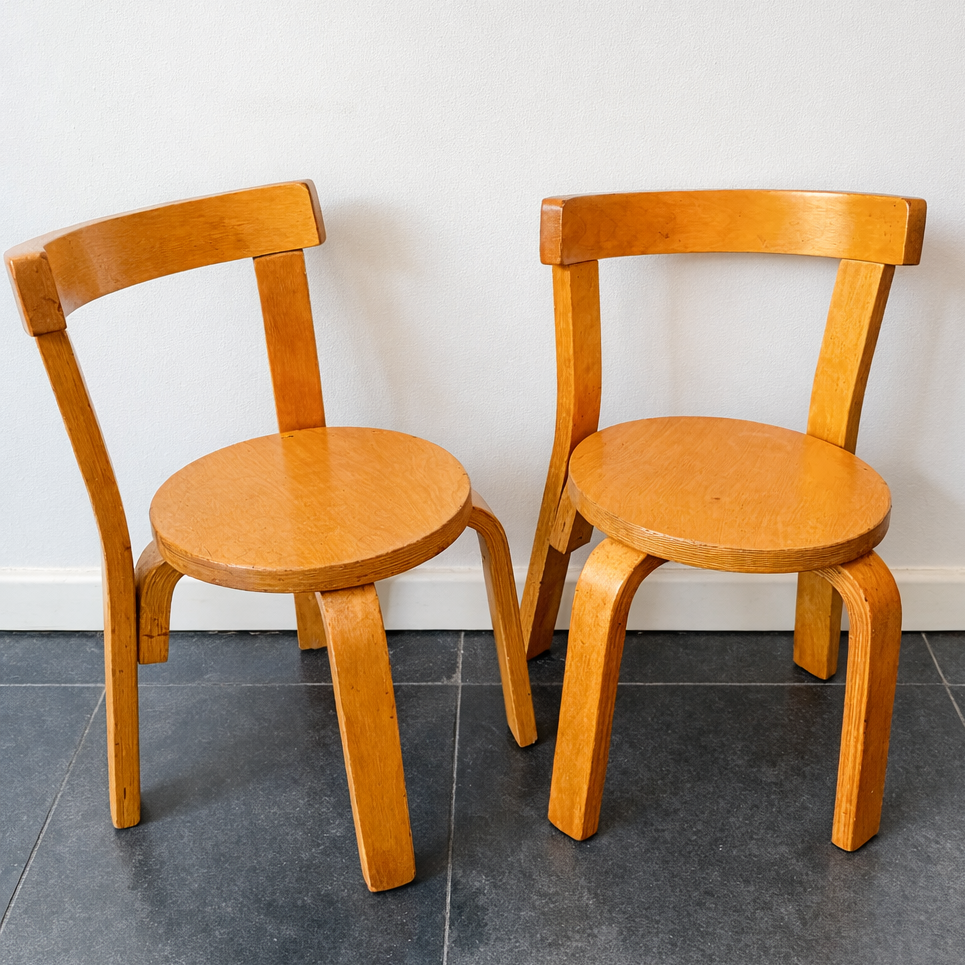Scandinavian Modern Model 68 kids chair attributed to Alvar Aalto, birch plywood design.