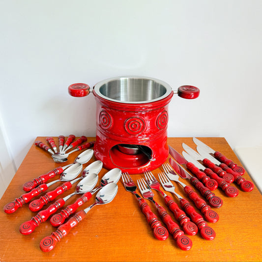 Mid-century style Wilkens Tirol cutlery set with red ceramic handles and matching fondue pot, Germany.