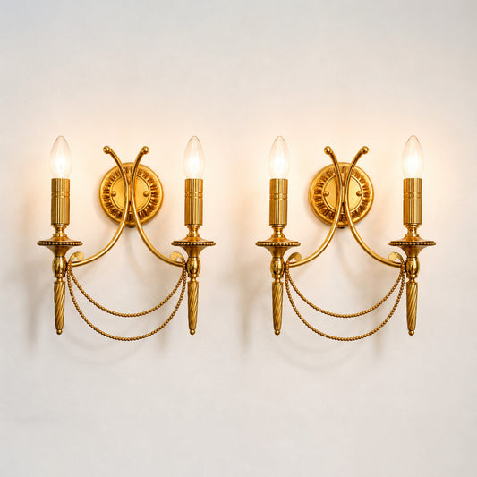 Hollywood Regency wall sconces by Sciolari in gilt brass, late 20th century.