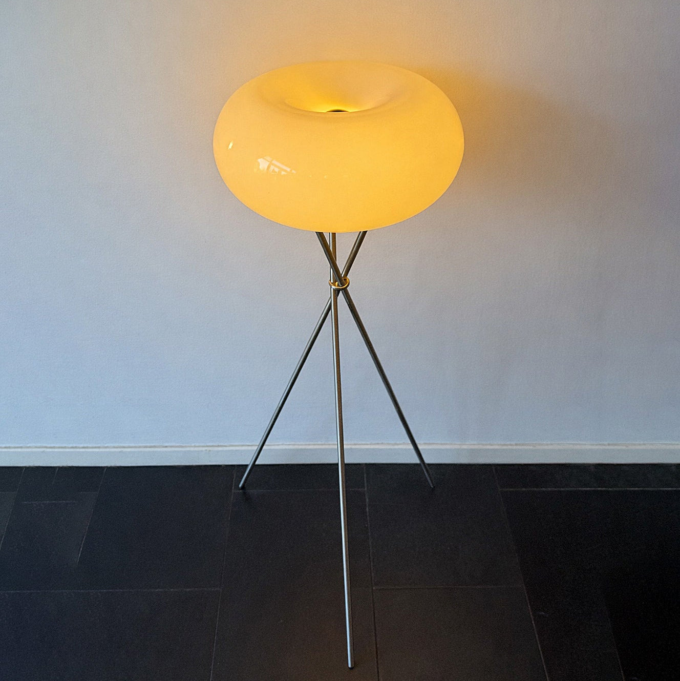 Modern floor lamp with opaline glass shade and metal tripod base, contemporary design. By vintagefindsbyrenata