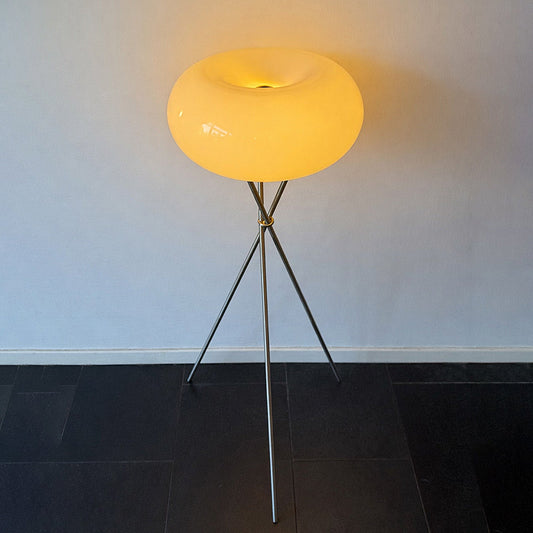 Modern floor lamp with opaline glass shade and metal tripod base, contemporary design. By vintagefindsbyrenata