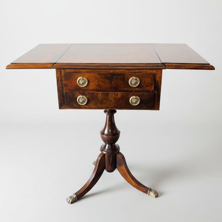 Classic antique Pembroke side table with brass claw legs and drop leaves, wood and brass vintage occasional table.